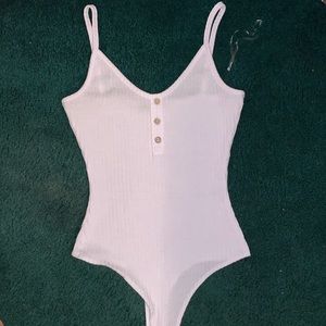 White bodysuit with buttons